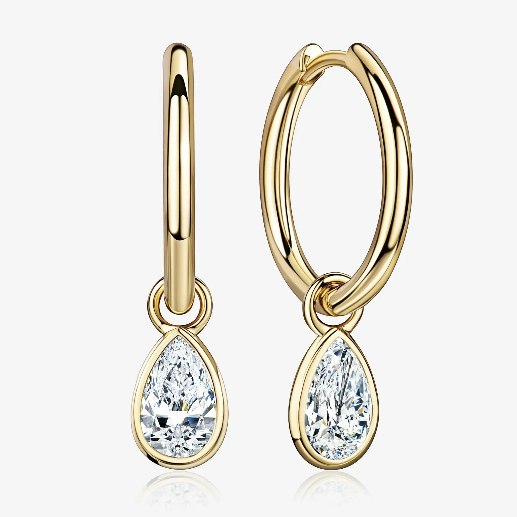 Золотые серьги с бриллиантовыми подвесками

Серьги-кольца со съемными кастами. 
Их дизайн отличается