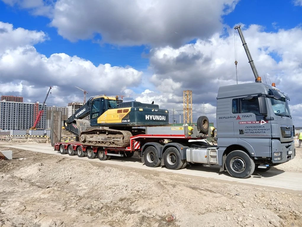 Перевозка экскаватора Hyndai R350, габариты 11х3,2х3,4 м, вес 32 тонны. Перевозка осуществлялась тра