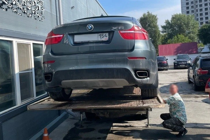 Не помогло: новосибирячка спрятала элитный BMW X6 на автосервисе, чтобы не отдавать банку 2,4 миллио