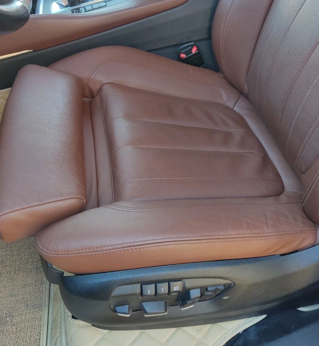 Проф покраска нижние части кожаных сидений BMW X6.