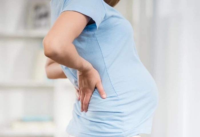 Почему во время беременности болит спина? 🤰