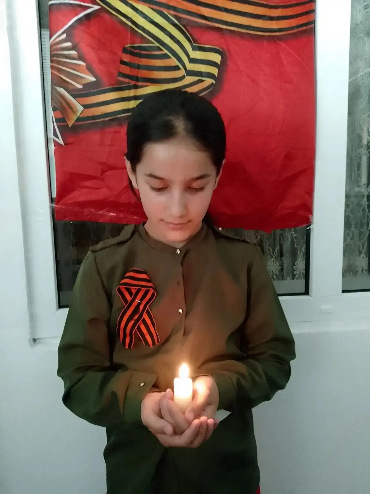 Ученица 5 класса Багова  Даяна присоединилась к акции «Свеча памяти». Классный руководитель Шокарова