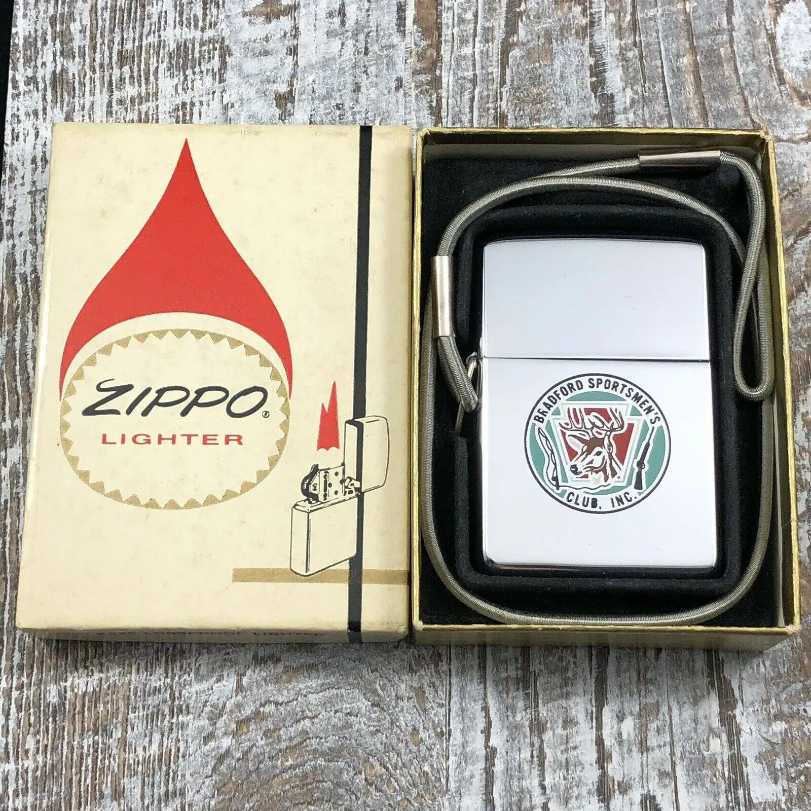 Zippo Lossproof "Bradford Sportsman's Club" - Etch & Paint, 1962 год.