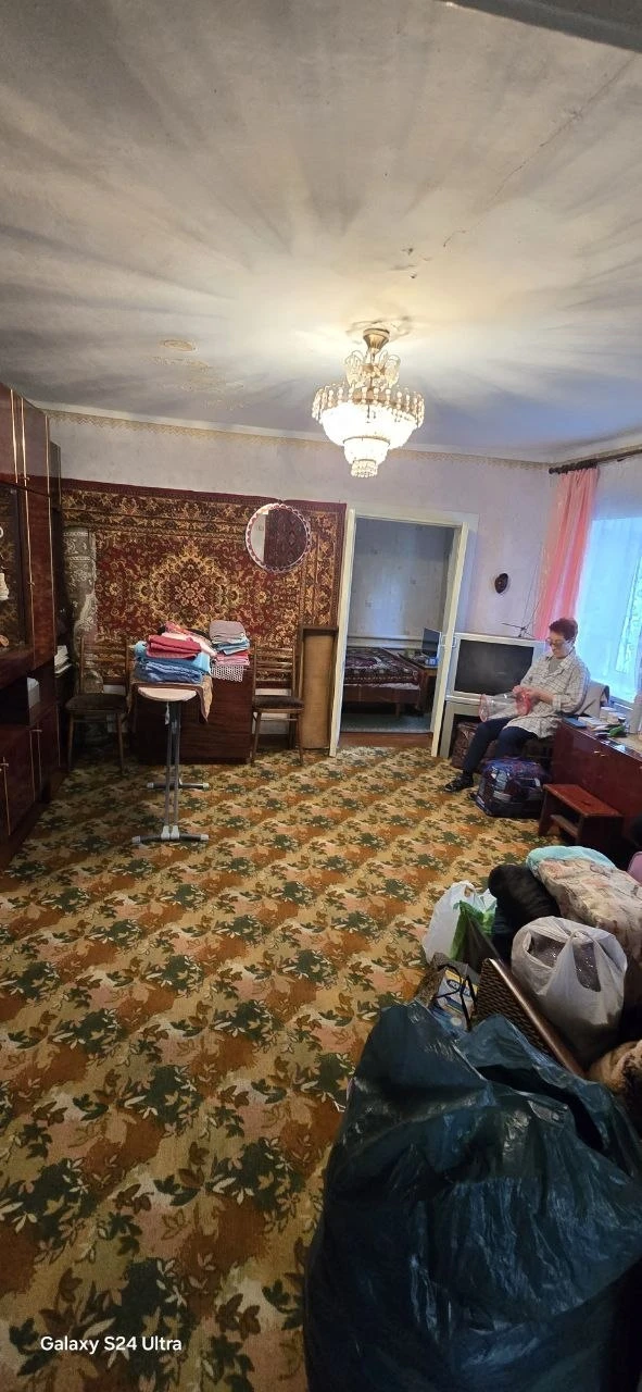 Продам в Центре Луганска, ул.Коммунальная район "Труженика с факелом", часть дома 50кв....
