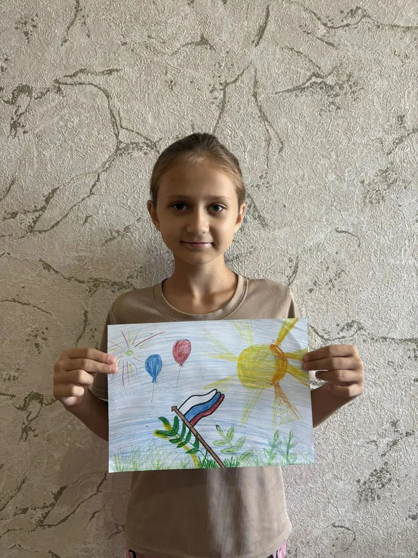 Ученица 4 класса МБОУСОШ 15 Белоглинского района принимает участие в Акции "Флаги России"