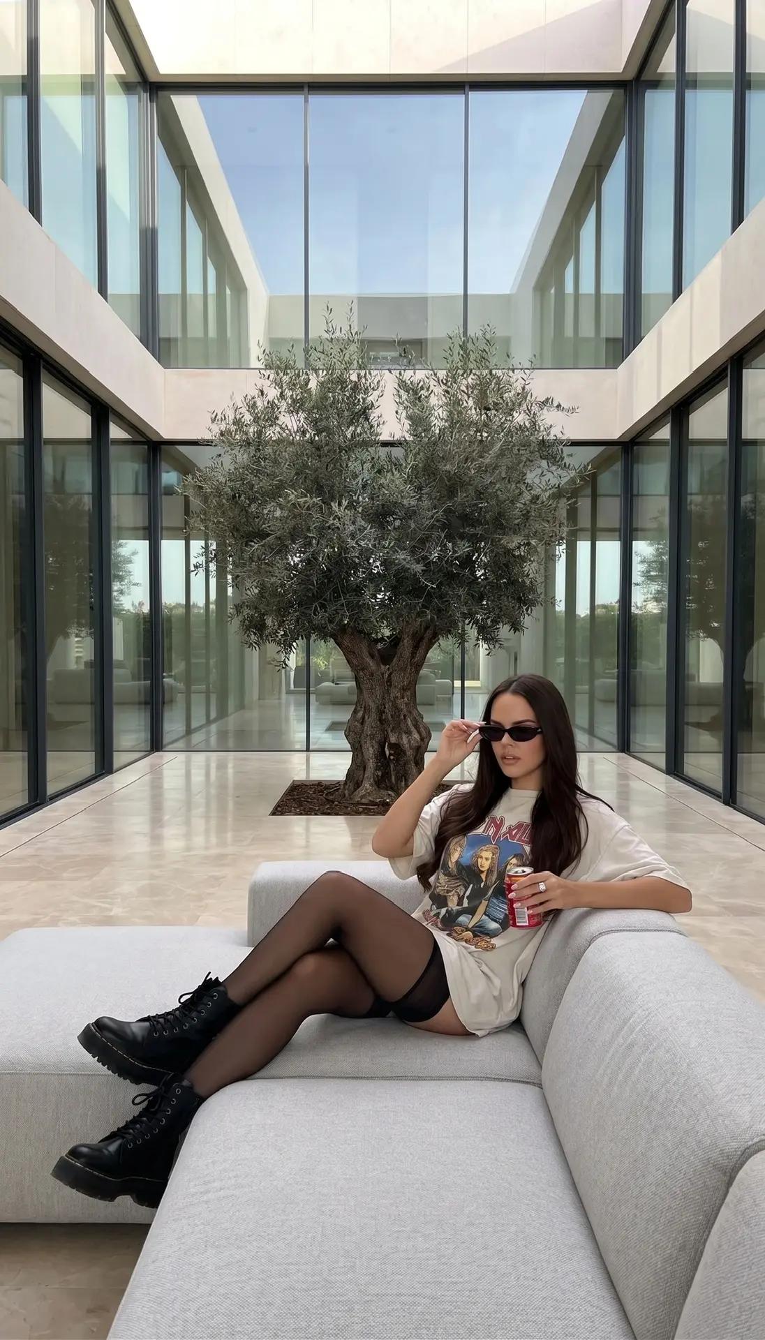 Ultra-realistic luxury lifestyle editorial photographed inside the courtyard of a conte...