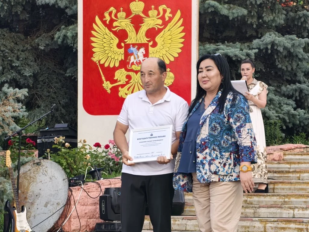 С. Куаналиев