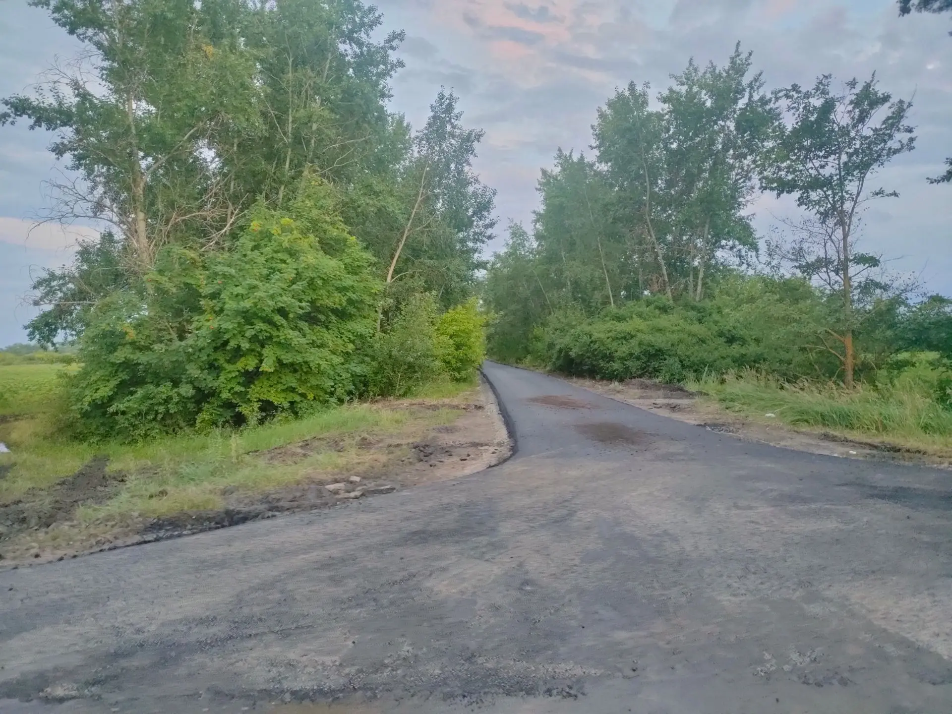 На улице Зелёной выполнили асфальтовое покрытие протяженностью около километра. Средств...