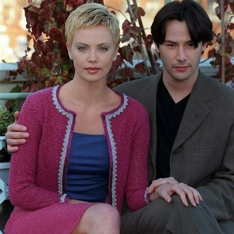 Киану с Шарлиз Терон на фотосессии к фильму Адвоката Дьявола, 1997 год