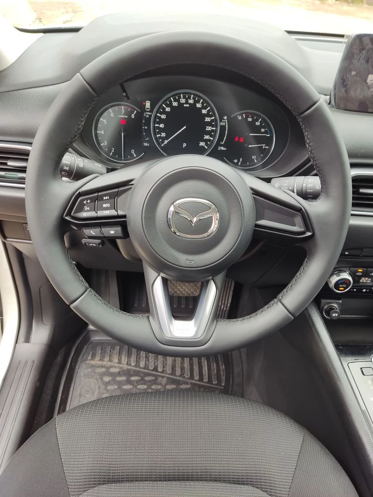 Перетяжка руля и подлокотника в натуральную кожу Nappa в новый авто Mazda cx5