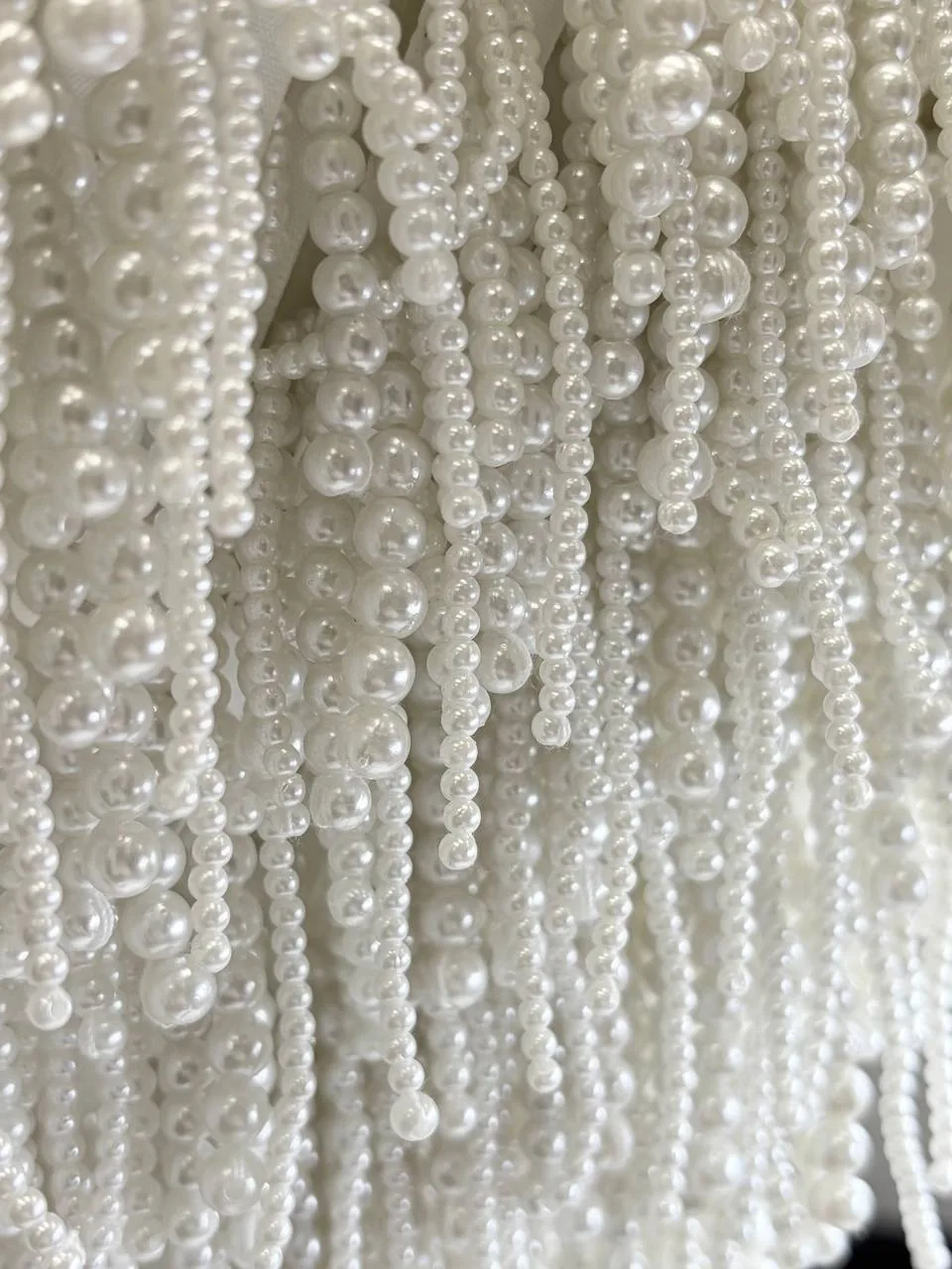 БАХРОМА из жемчуга
stock Giambattista Valli
цвет БелыйФРАНЦИЯ🇫🇷

Бахрома разной длины, максимальна
