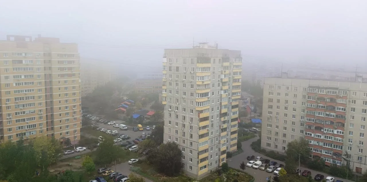 Утренний туман с примесью гари.
