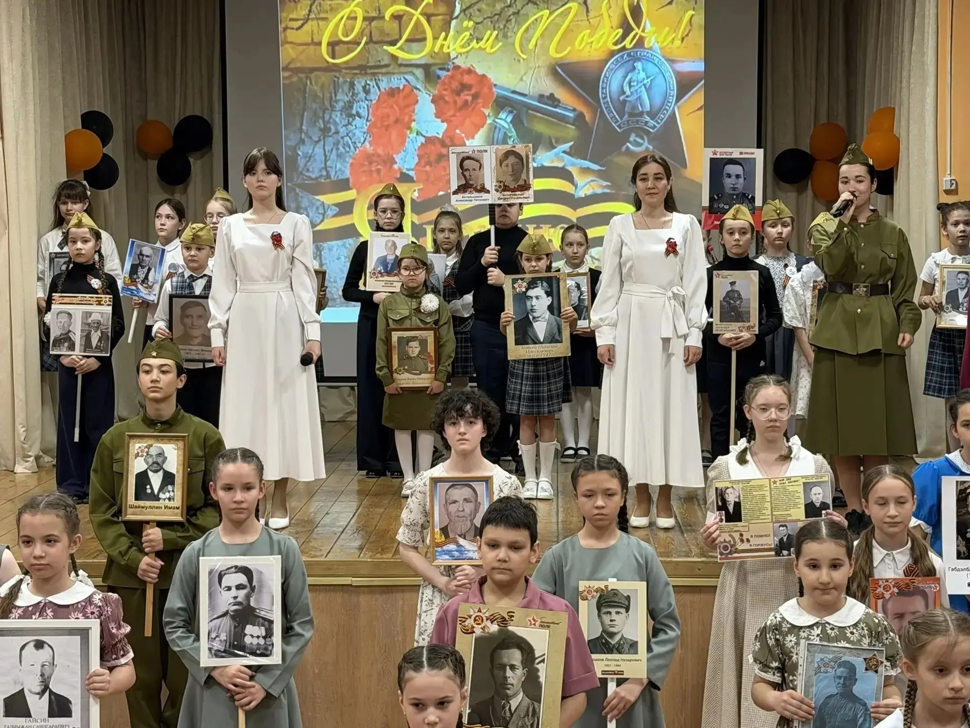 В нашей школе прошла акция «Бессмертный полк». Учащиеся почтили память предков, приняв ...