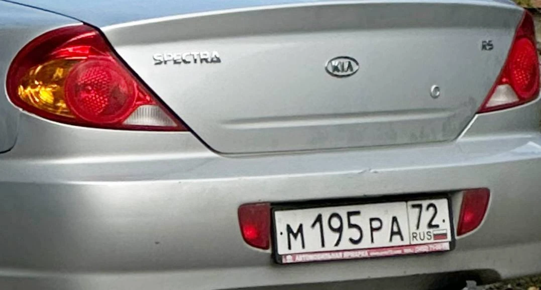Водитель KIA Spectra М195РА