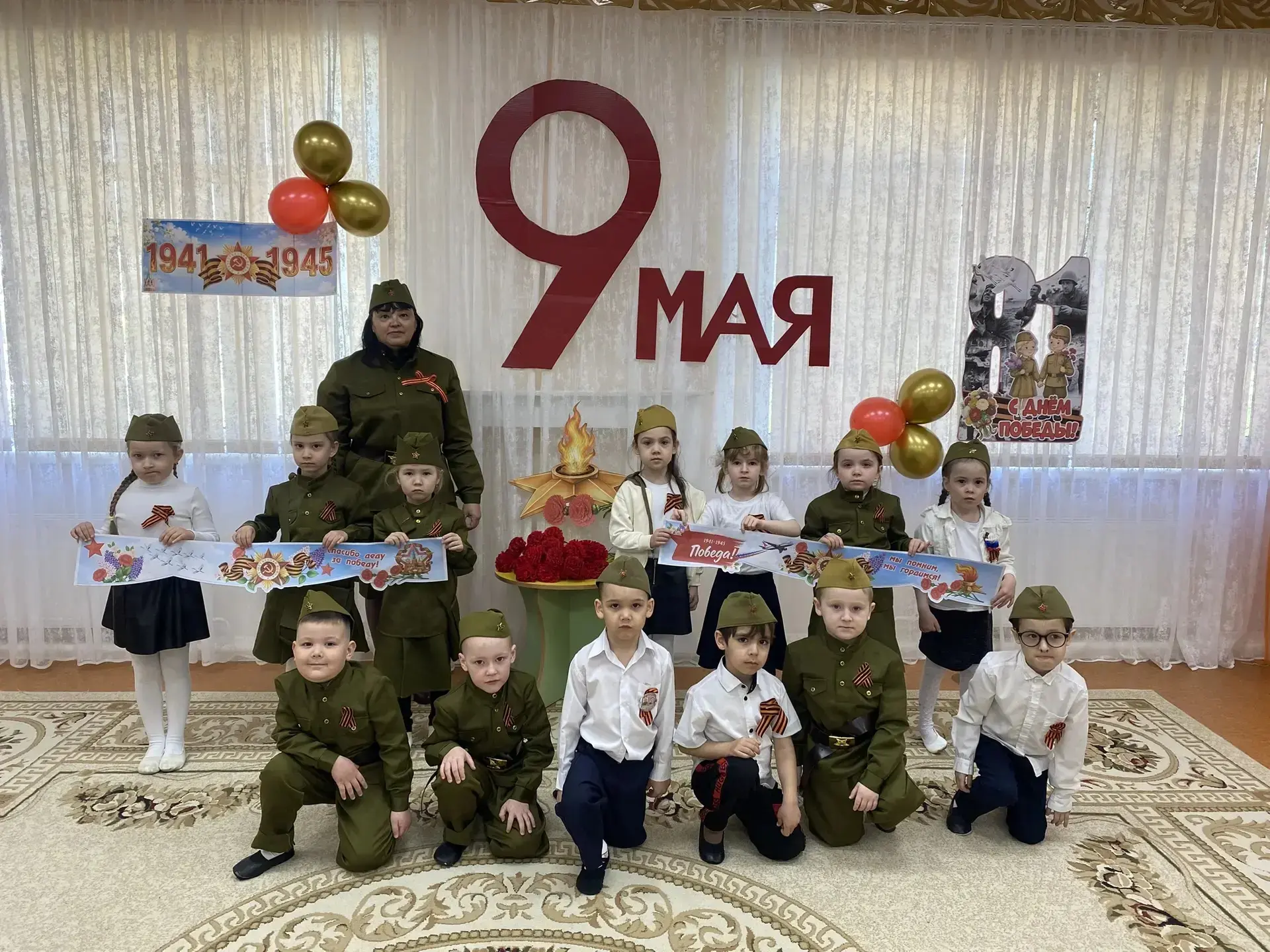 Праздник, посвященный Дню Победы. Воспитанники групп N21 и 22 подготовили стихи и песни...