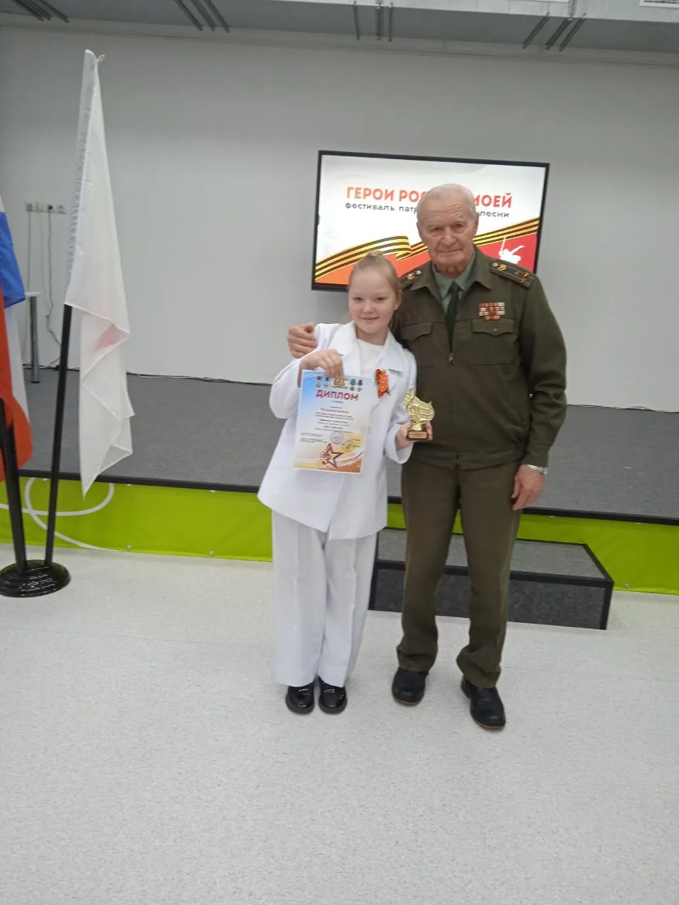 🔥 Наши ученики покорили сцену Фестиваля патриотической песни, посвящённого Дню Героев Отечества!  🎤 