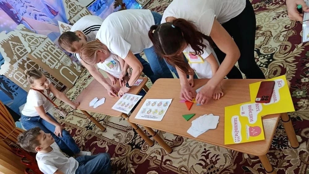 «IQ-семейка»: в Томске прошел интеллектуальный конкурс с участием детей и их родителей  Четвёртый го