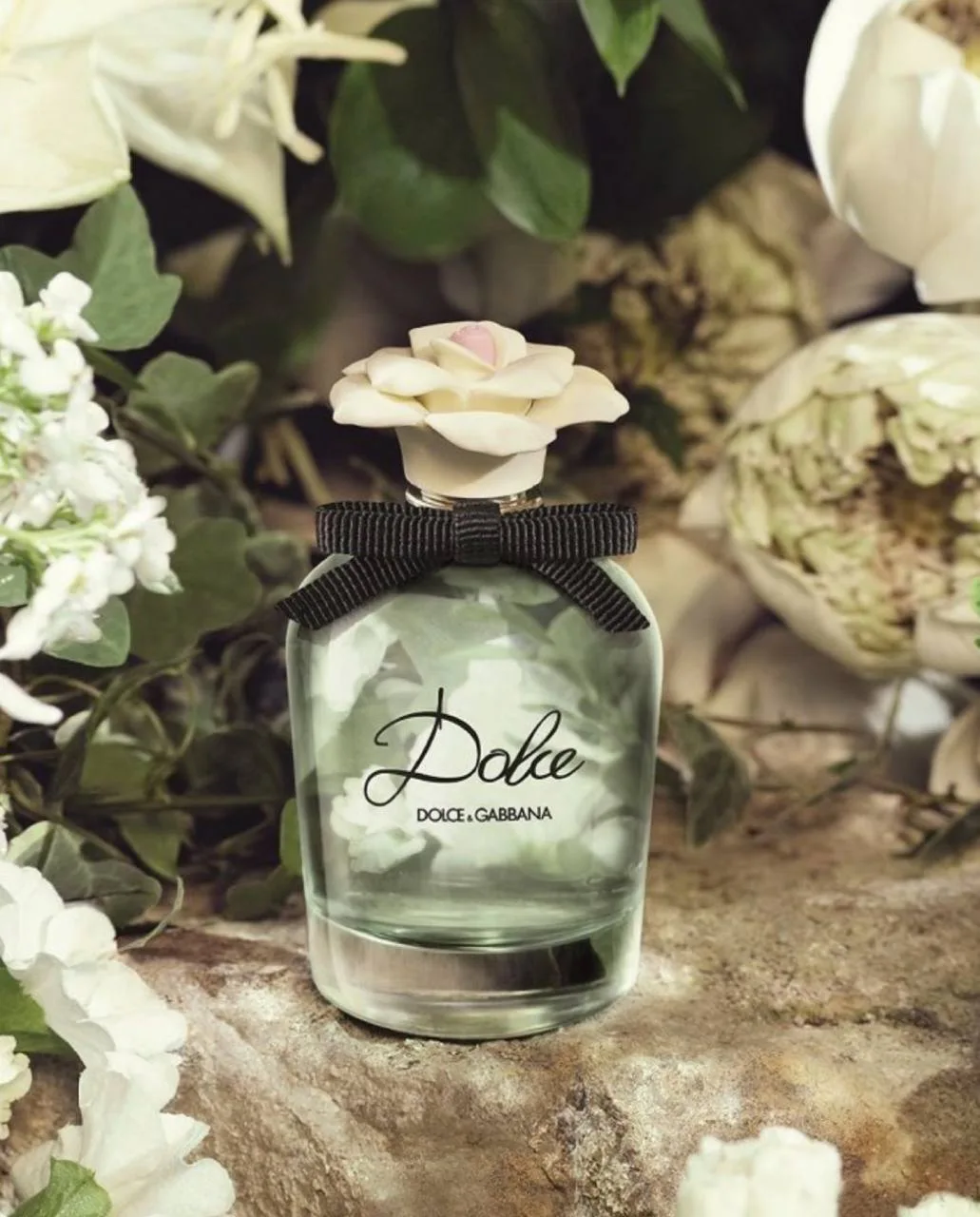 DOLCE & GABBANA dolce открывается ярким всплеском нероли и цветков папайи. В сердце нот...
