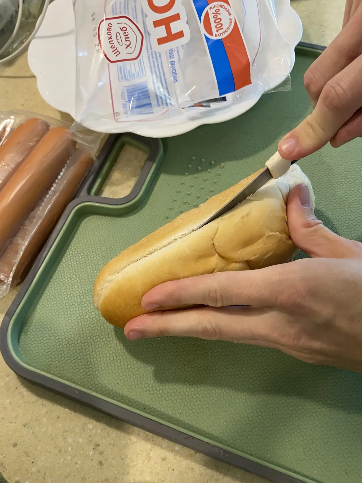 Cut the bun lengthwise.