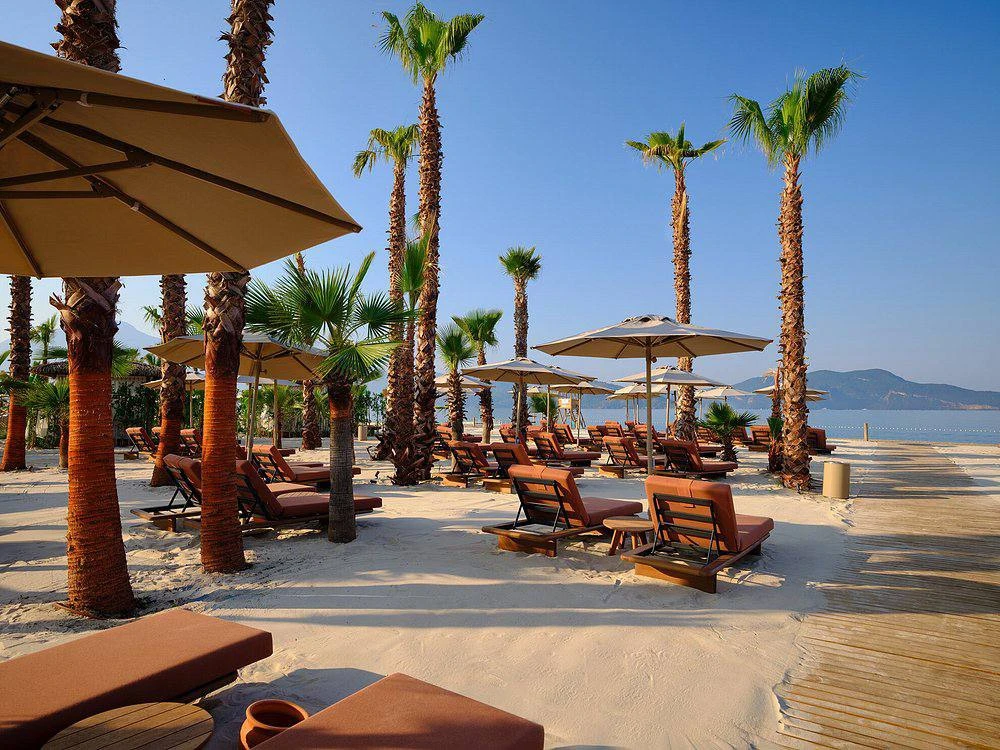 Новый пляж QUMA Beach в Фетхие: для гостей XO Cape Arnna Club 5* вход бесплатный
