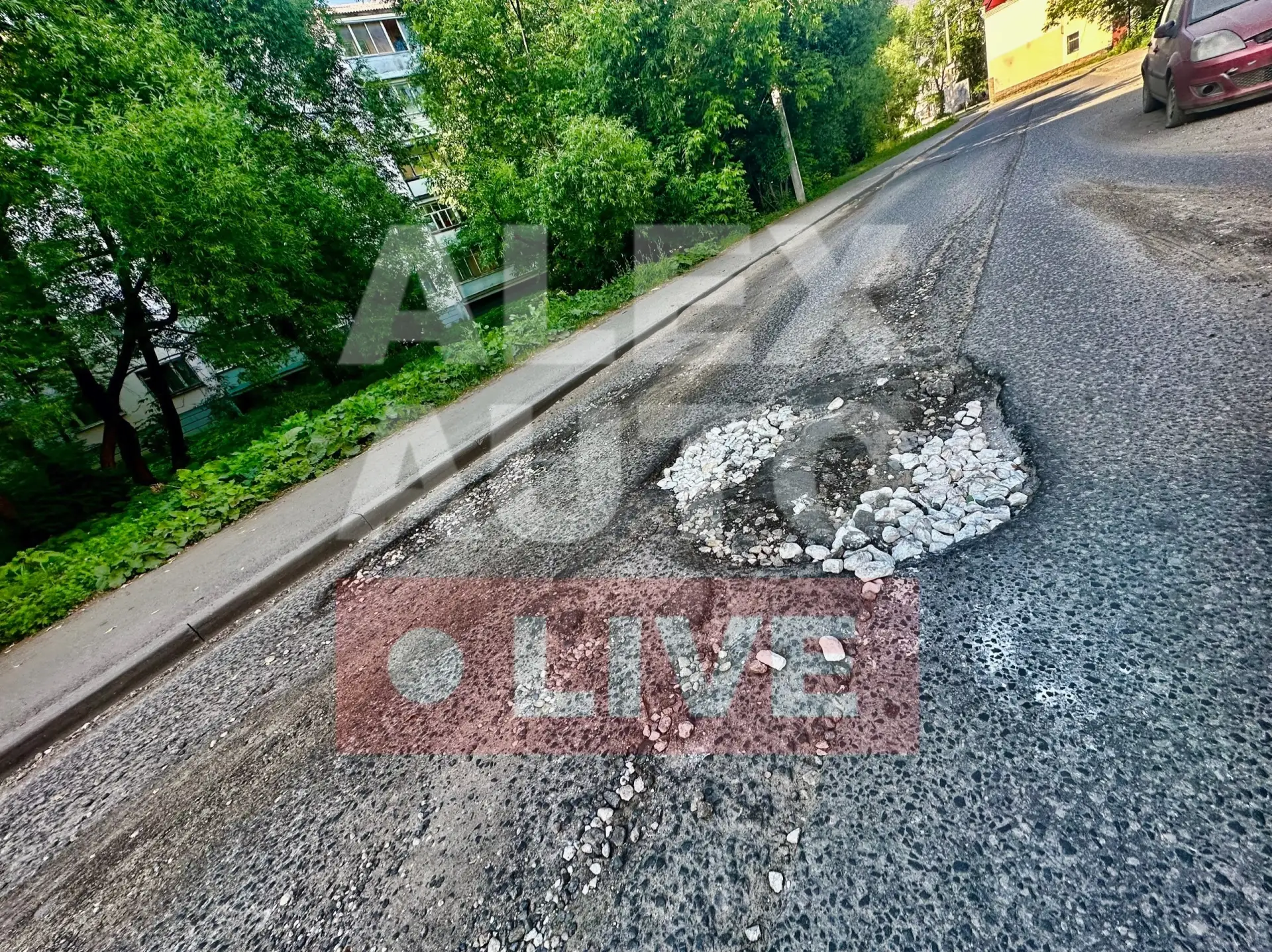 Администрация города, можно обратить внимание на данные ямы на Ул. Переулок Сосновский, рядом с домо