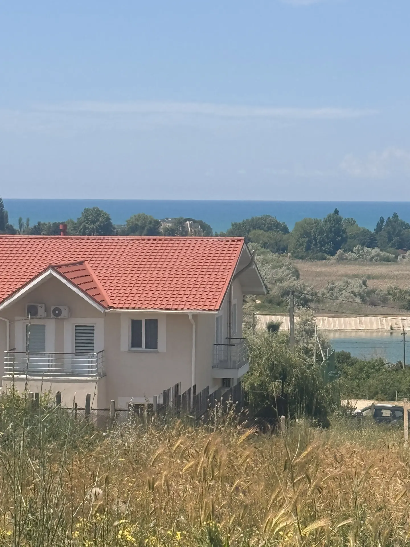А это вид сверху на озеро и море