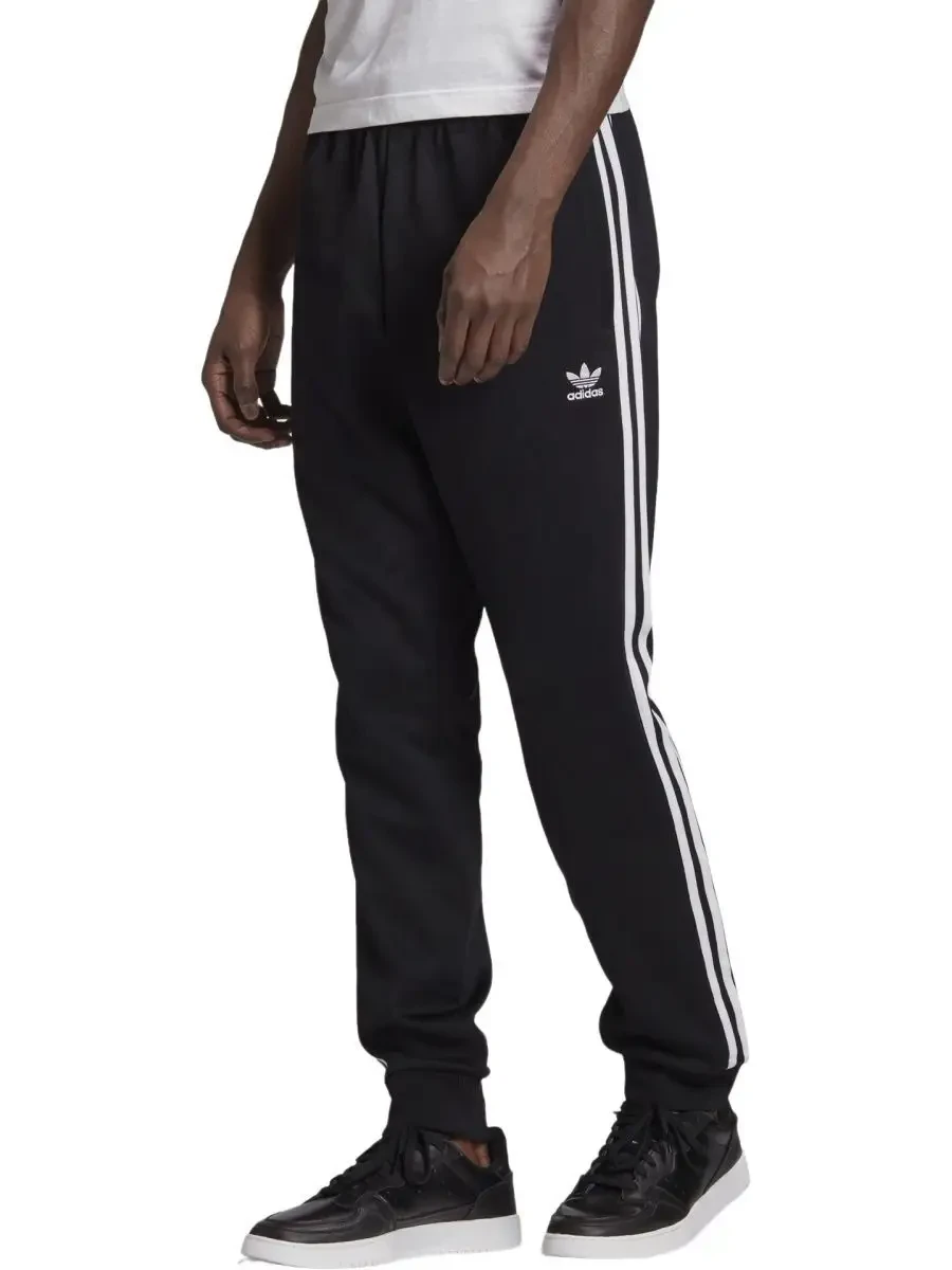 ⚡️ 69,6%   | Брюки Adicolor Classics Primeblue SST Tapered Track Pants