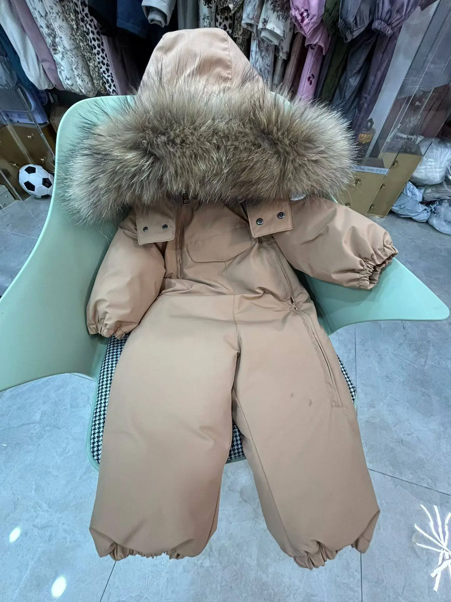 Детский слитный комбинезон Moncler с натуральной меховой опушкой