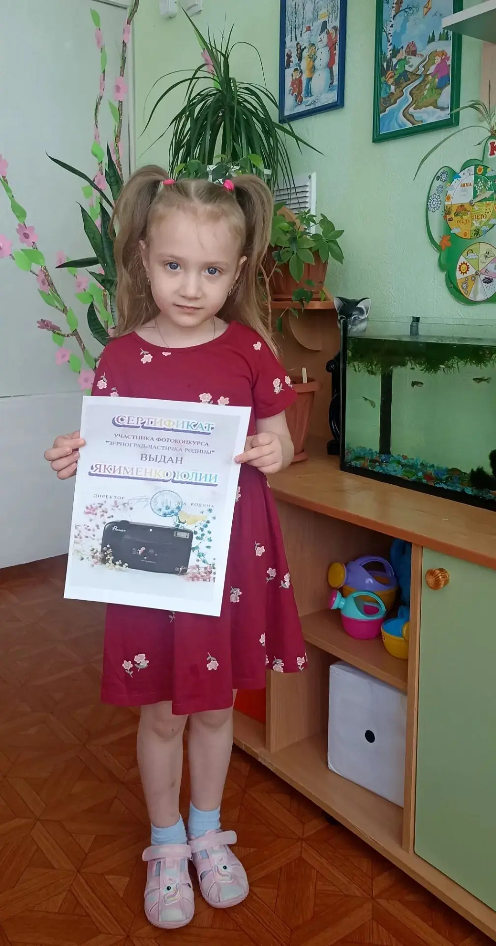 Гордость нашего детского сада! Семья Якименко получила сертификат участника фотоконкурса «Зерноград 