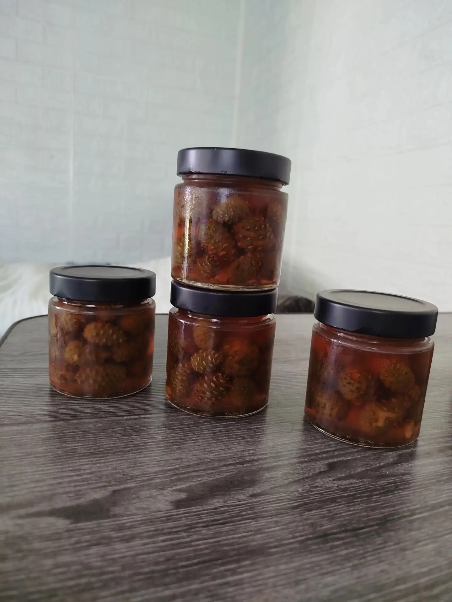 Продам варенье из зелёных сосновых шишек. Банки по 0,2 л. В наличии 100 шт. При оптовой закупке цена