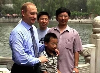 Как быстро растут чужие дети  Владимир Путин во время визита в Китай встретился с инженером Пэн Паем