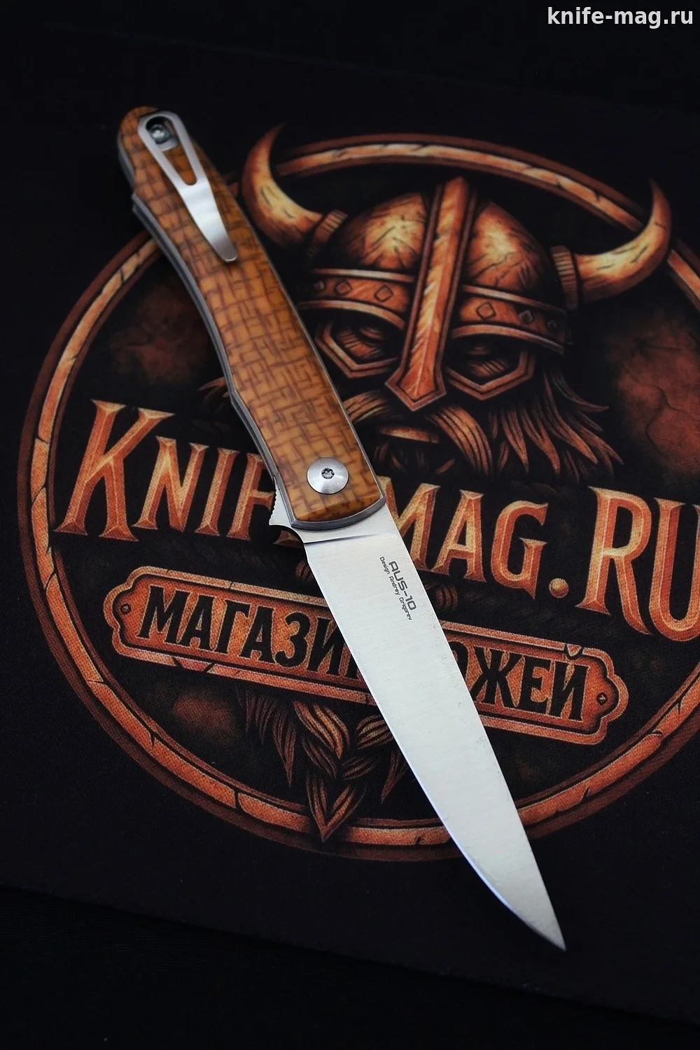 Складной нож Minimus G-10 Brown 
N.C.Custom 
Марка стали: AUS-10 
Общая длина: 205 мм 
Длина клинка: