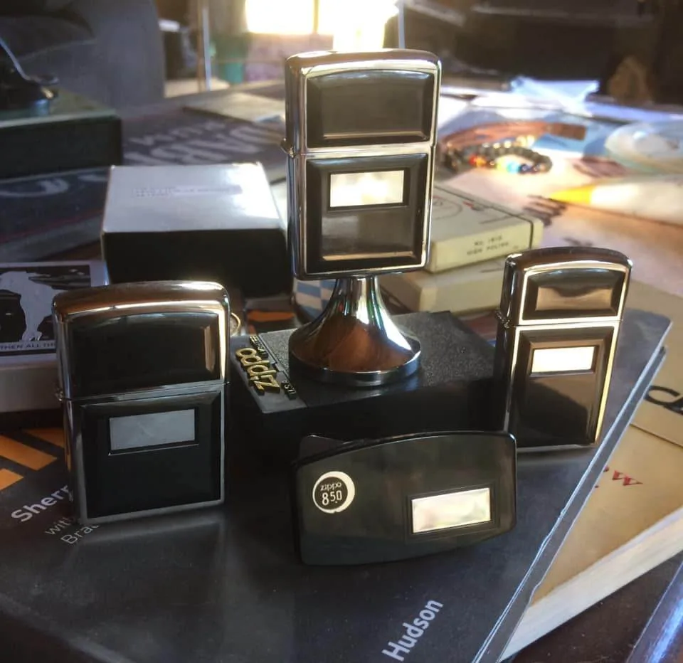 Зажигалки и карманный нож Zippo Black Ultralite.