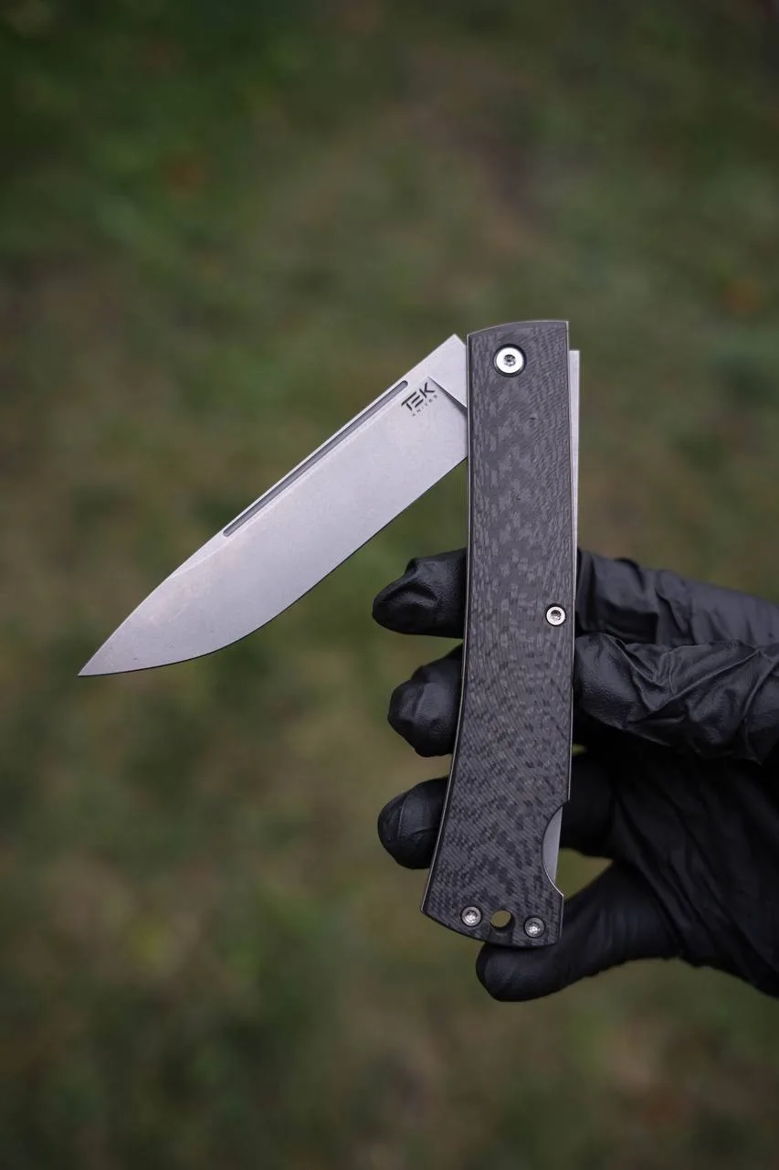 Складной нож с замком бэклок из стали м390;