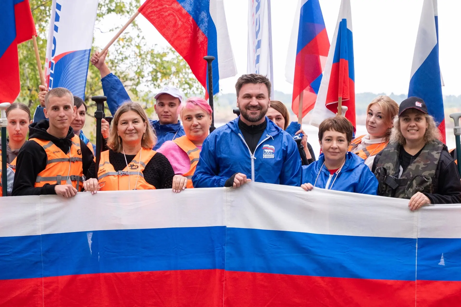 Патриотический SUP-заплыв, приуроченный ко Дню Государственного флага Российской Федера...
