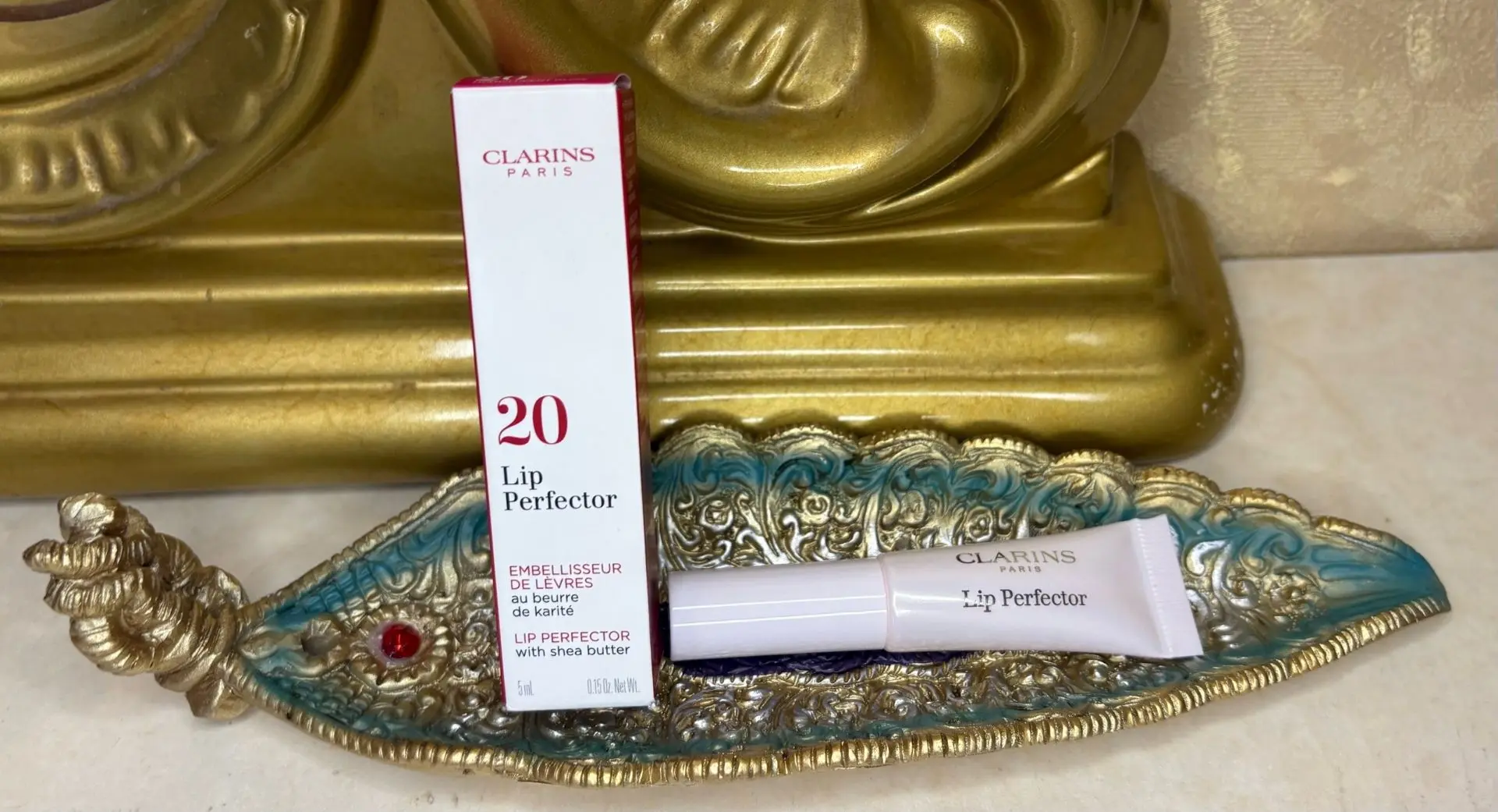 Clarins увлажняющий и придающий объем блеск для губ "Lip Perfector"