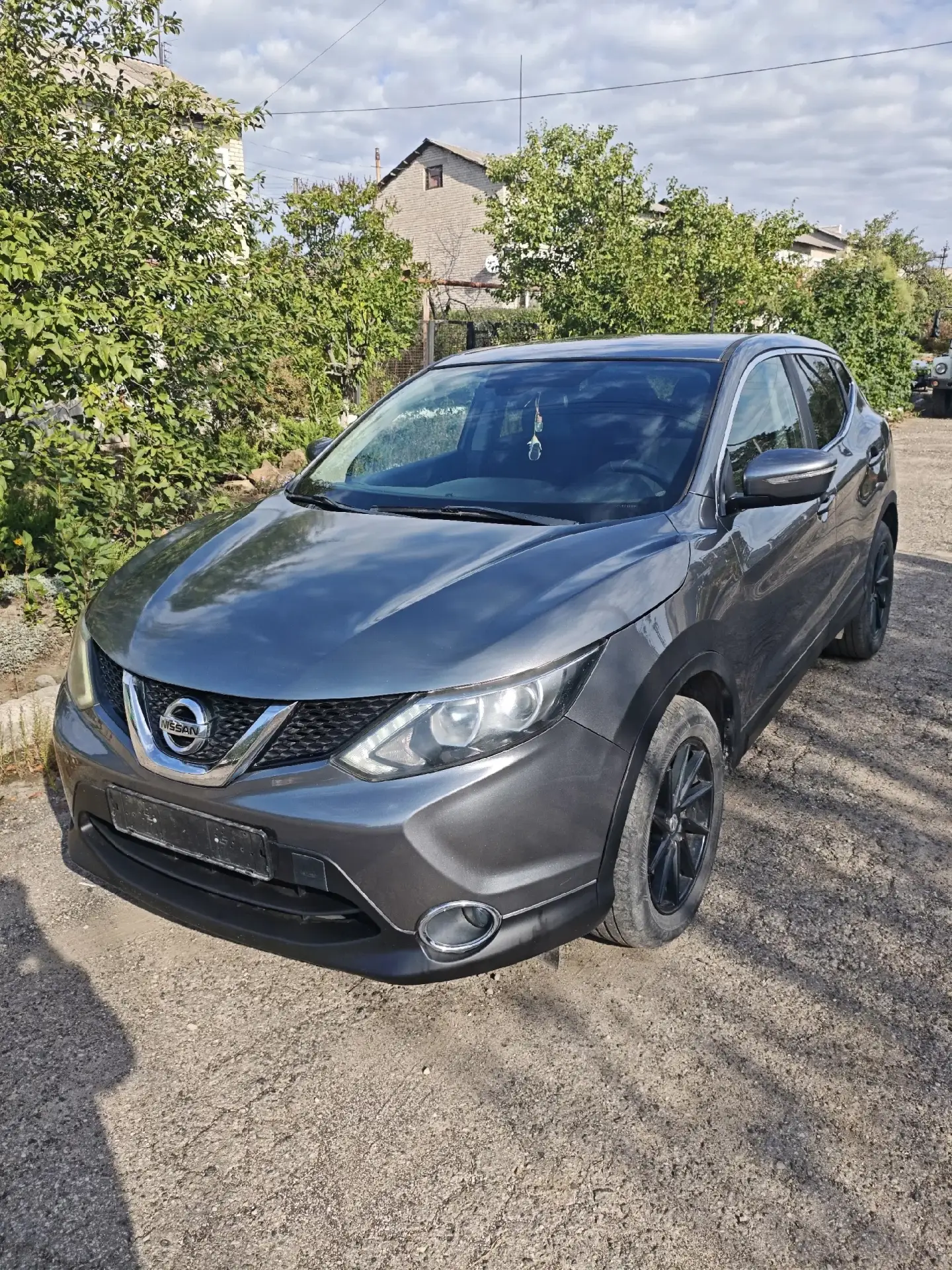 Nissan Qashqai второго поколения (индекс J11). 2014 года выпуска, легковой (универсал),...