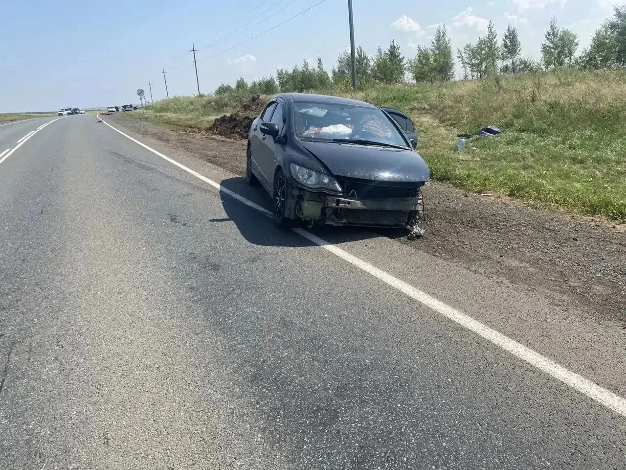 В Оренбургском районе эвакуатор опрокинулся после столкновения с Honda Civic

24 июля на трассе М-5 