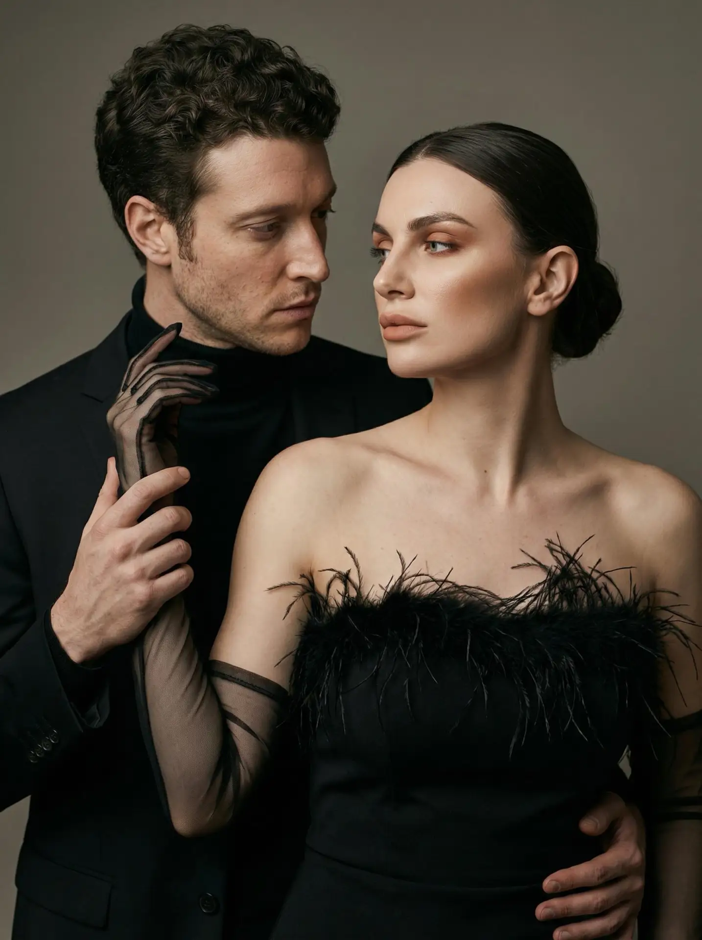 🖼 Man and a woman are standing in a studio