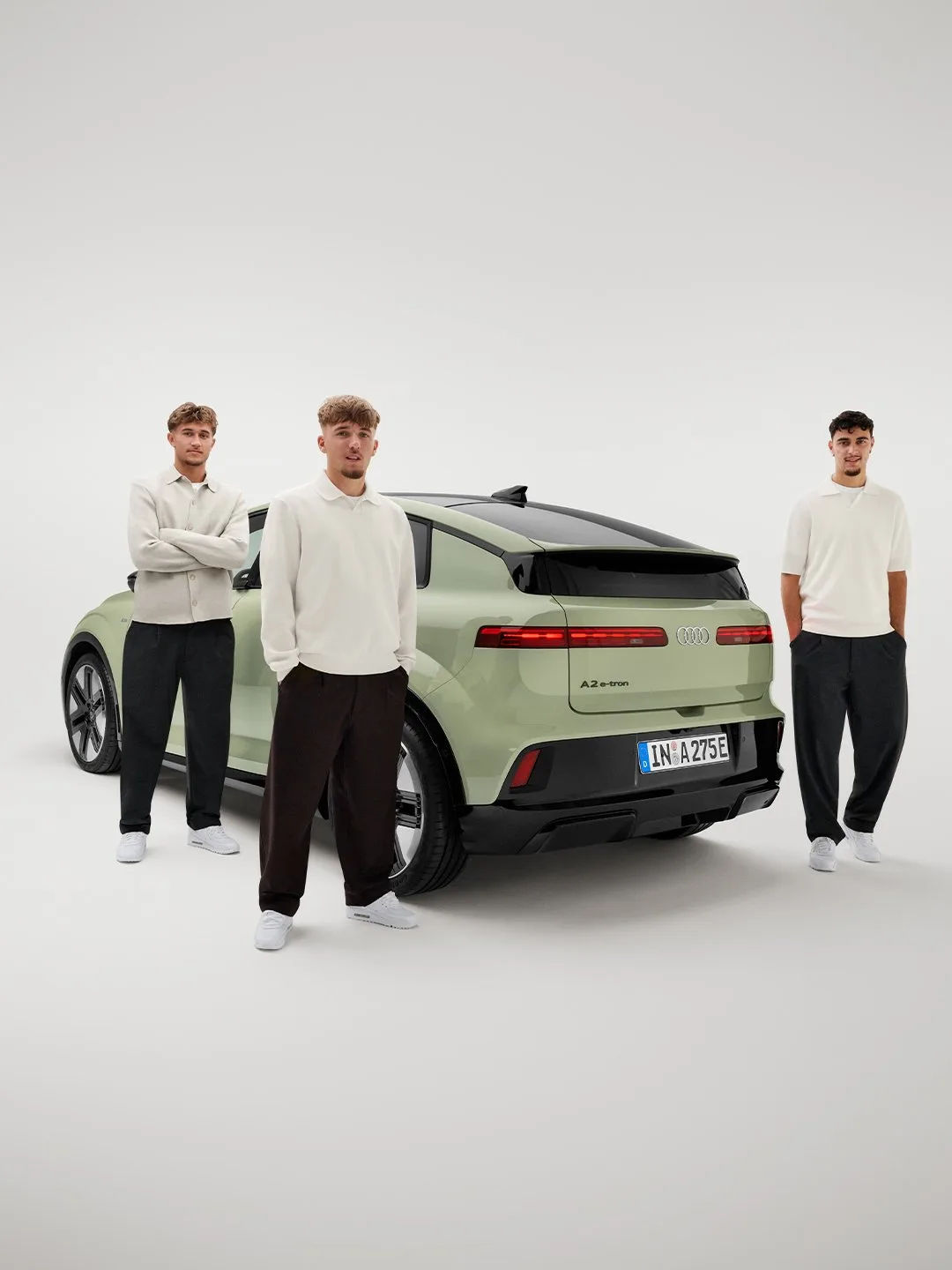 Павлович, Бишоф и Карл с новым Audi A2 e-tron.