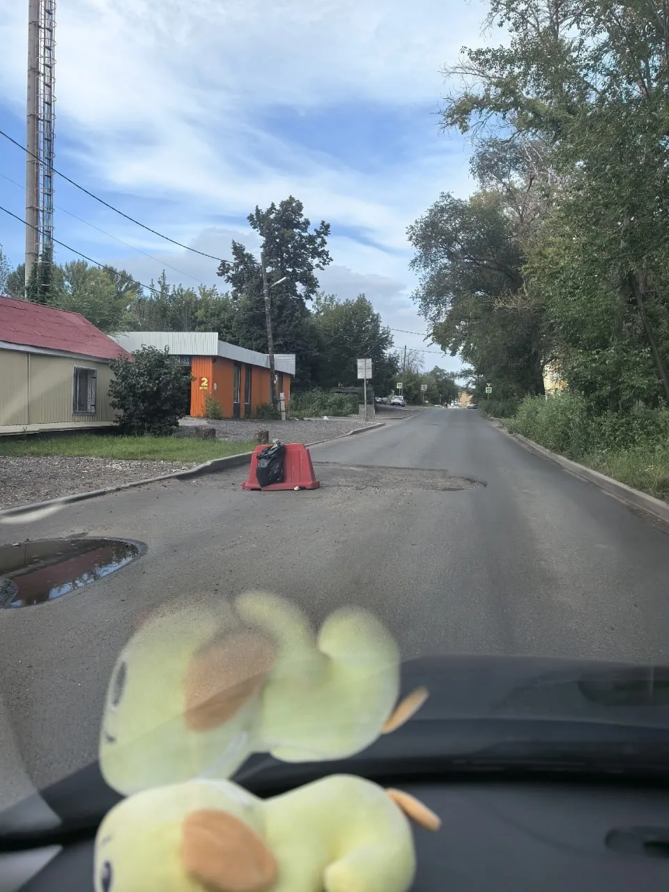 На Нагорной улице после ремонта просел асфальт. Движение между Ташкентским переулком и ...