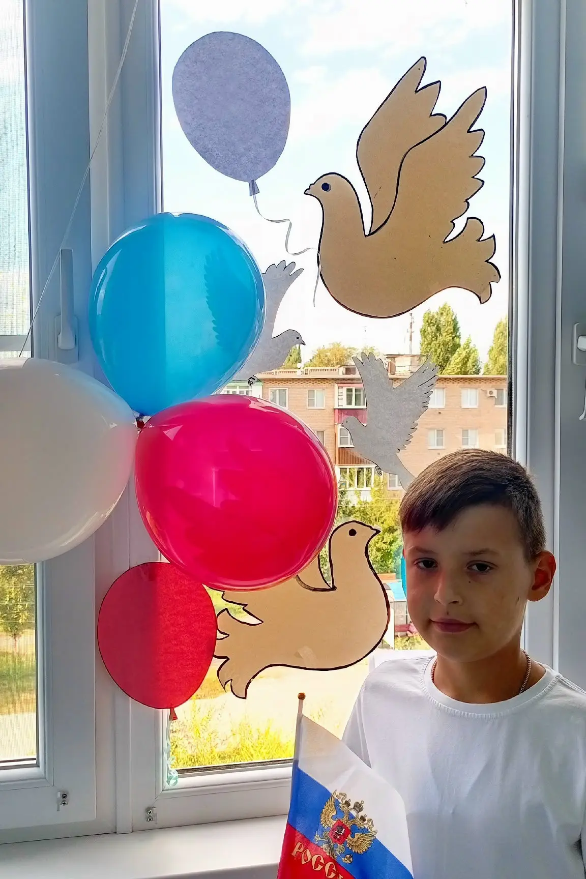 Я, Чурилин Иван, ученик 5 Б класса, принимаю участие в акции «Флаг России в каждый дом».