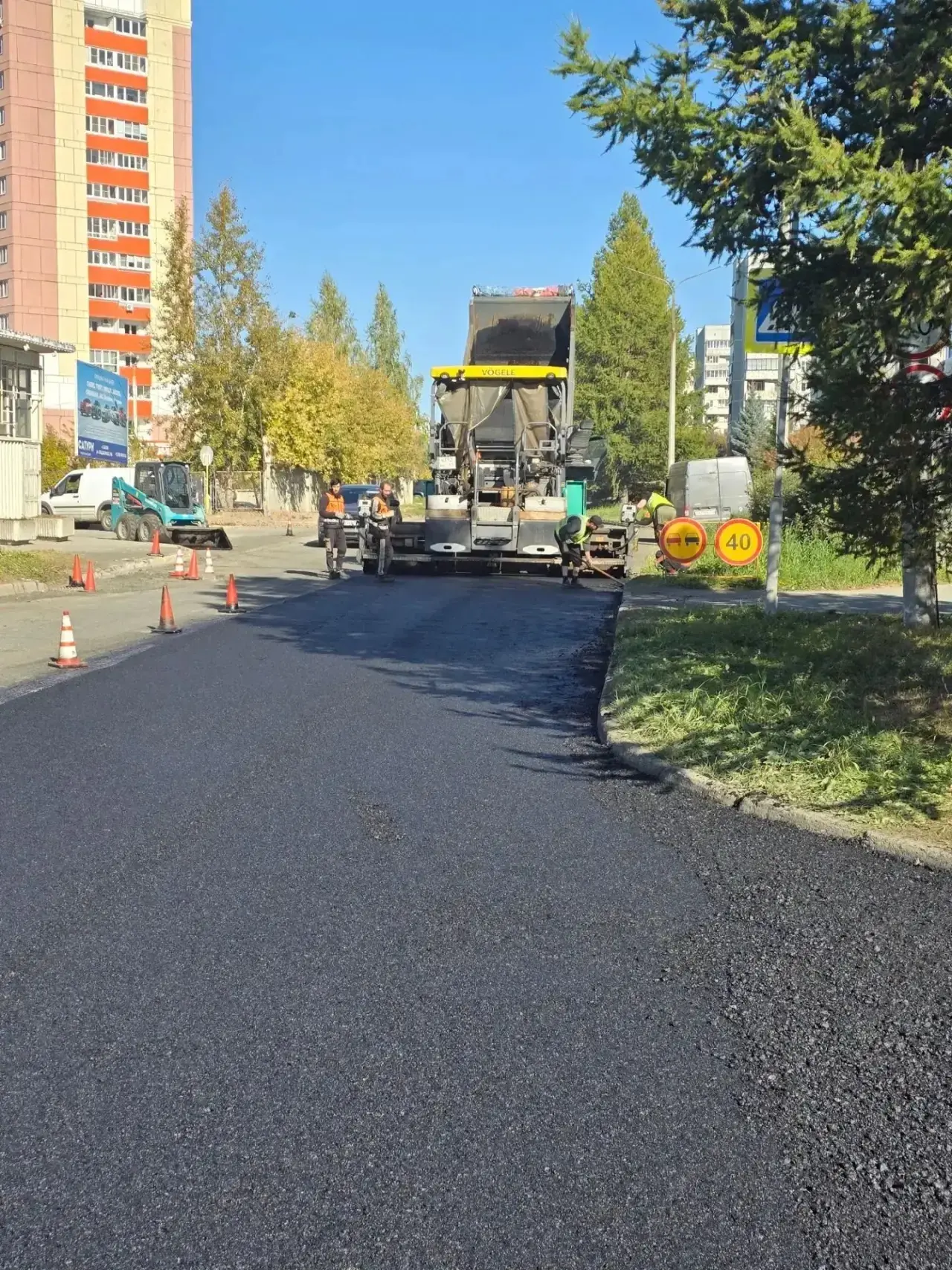 На Карла Маркса укладывают новый асфальт