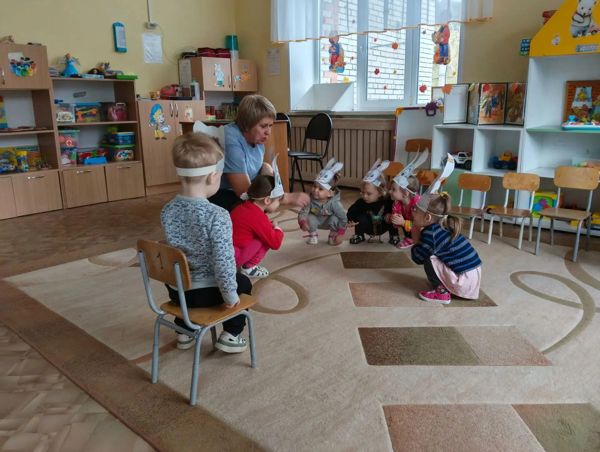 Развлечение: "Как мы знакомились с дикими животными и играли в «Зайцы и волк»