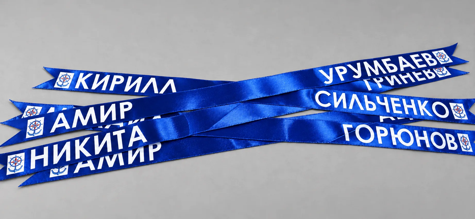 Выполнили ДТФ-нанесение на синие атласные ленты.