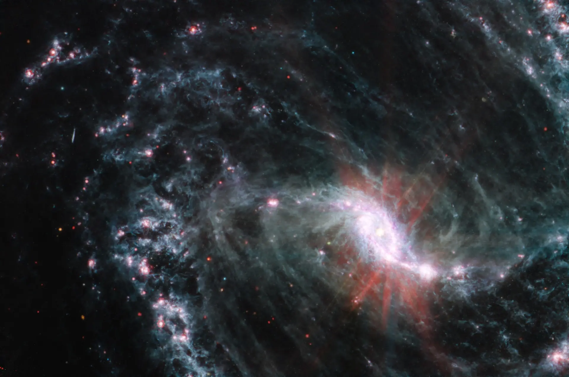 Спиральная галактика с перемычкой NGC 1365 по данным «Уэбба» [Космокадр 18.02.2023]