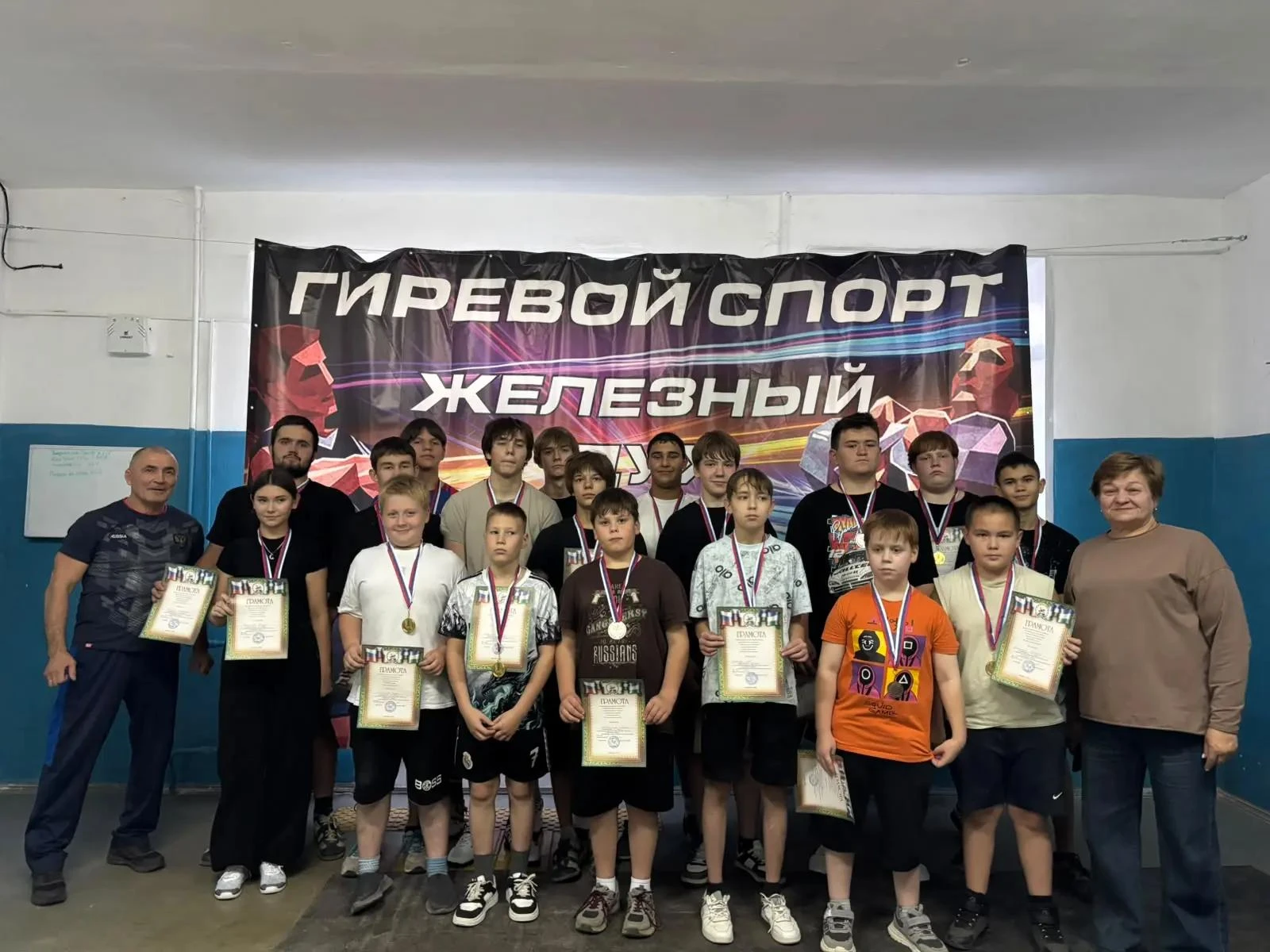 💪В спортивной школе "Чемпион" на базе гиревой секции прошёл открытый турнир, посвящённ...