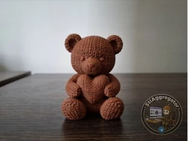 Плюшевый мишка с сердцем
