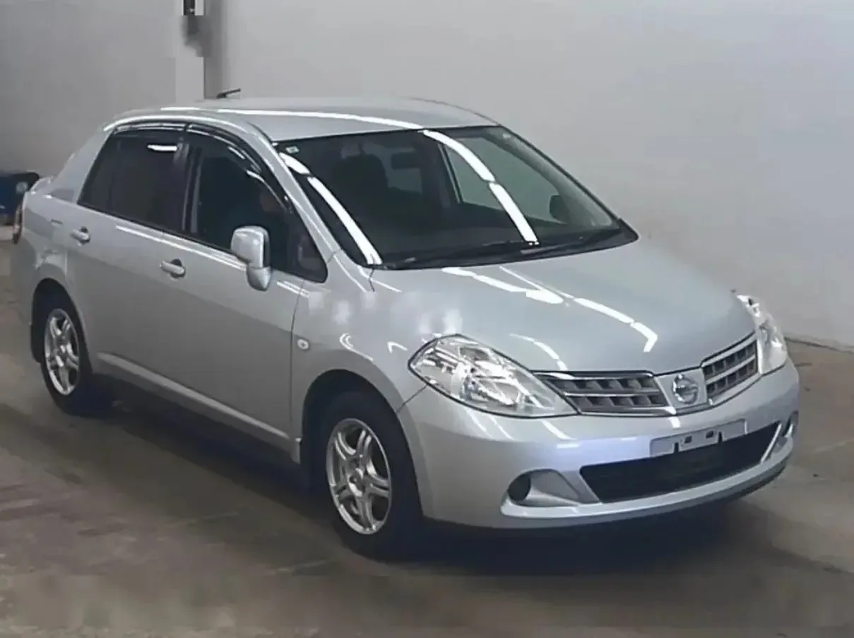 Купили NISSAN TIIDA LATIO 15M