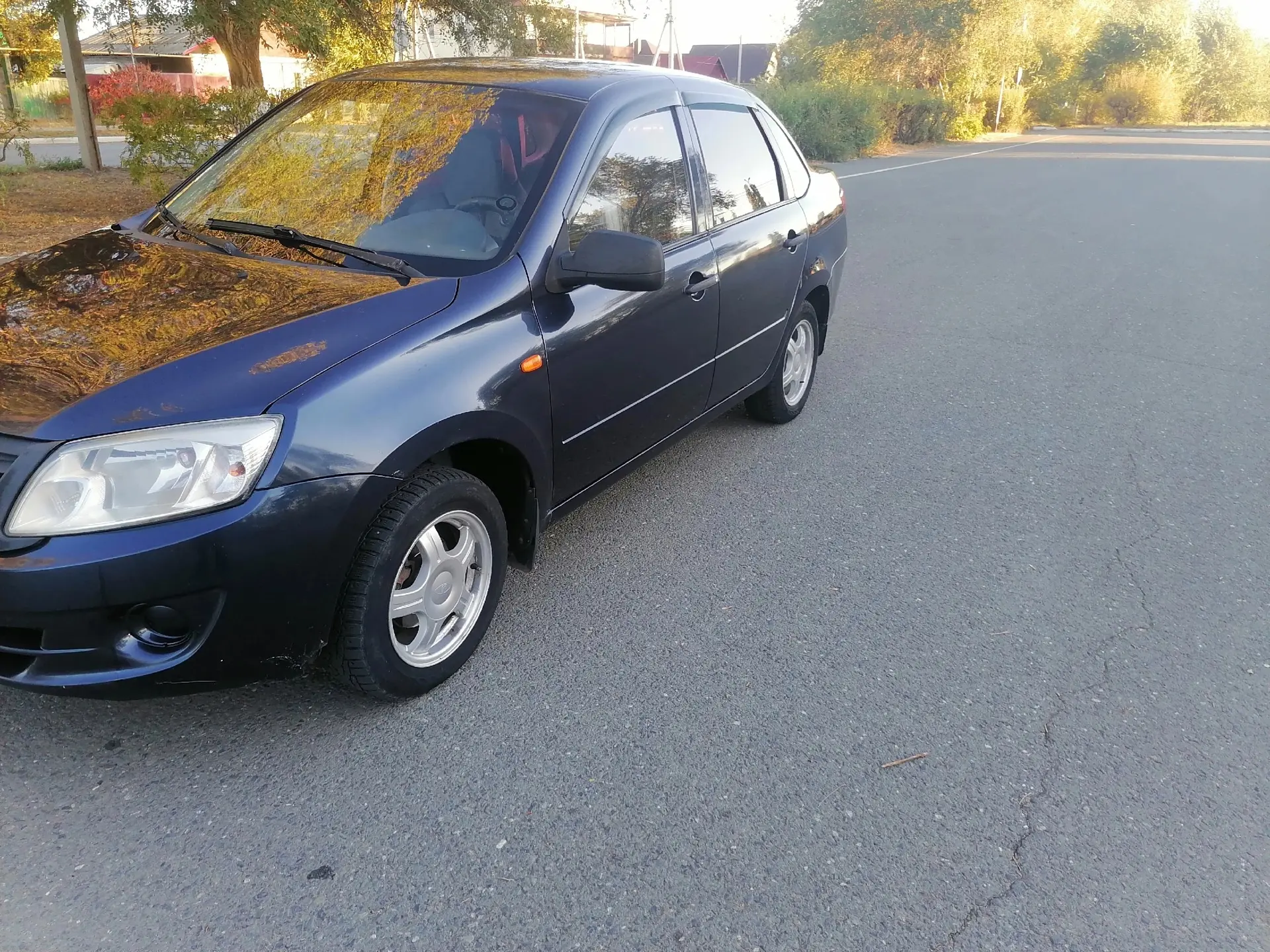 Продам ладу гранту 2012 года в хорошей состояние Автотека зелёная без ДТП стаканы морда...